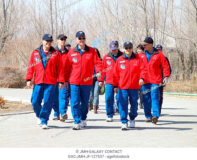 Outside the Cosmonaut Hotel crew quarters in Baikonur, Kazakhstan, the prime and backup Expedition 27 crew members take time from their pre-launch preparations...