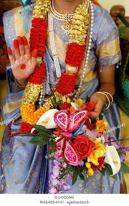Girl impersonating Hindu goddess Radha Krishna's consort at Janmashtami festival at Bhaktivedanta Manor ISKCON Hare Krishna temple, Watford, Hertfordshire