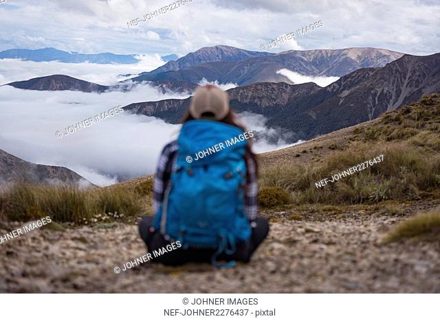 Young woman looking at mountains