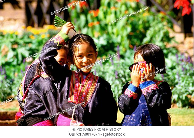 Thailand: Hmong hill tribe girls playing near the Queen Sirikit Botanical Gardens, Mae Sa Valley, Chiang Mai, northern Thailand