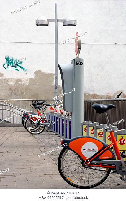 Bicycles at a hire bycicle station of the company Citybike Vienna standing one after the other