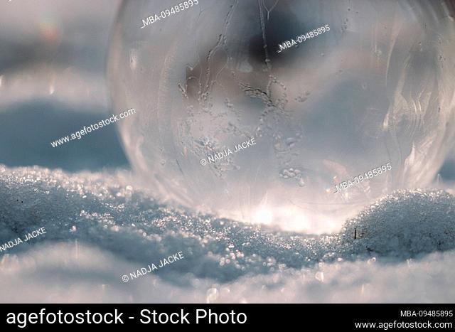 Ice ball in the snow, close-up