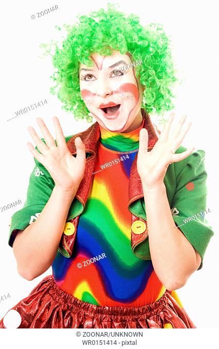 Cheerful female clown. Isolated on white background
