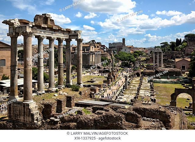 View of the Roman Forum with the Colosseum in the distance in Rome, Italy