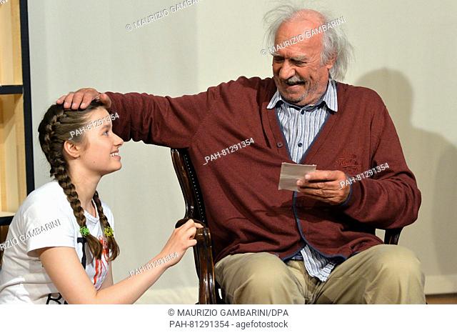 FILE - A file picture dated 30 May 2016 shows Achim Wolff as Amandus Rosenbach and Nastassja Revvo as Tilda Rosenbach standing on stage during a press rehearsal...