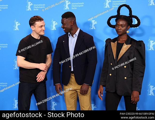20 February 2023, Berlin: Actors Franz Rogowski, Morr Ndiaye and Laetitia Ky arrive for the photocall of the film ""Disco Boy""