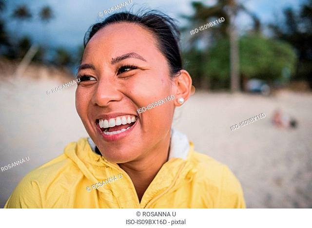 Portrait of laughing woman, Kailua Beach, Oahu, Hawaii