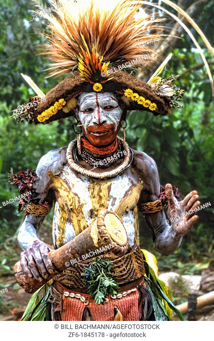 Colorful Huli Wigmen w/ Painted Face In Papua New Guinea