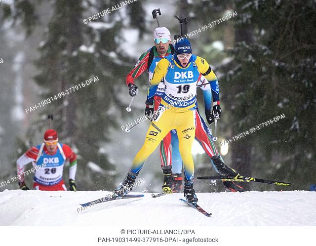 13 March 2019, Sweden, Östersund: Biathlon: World Championship, singles 20 km, men. Soma Gyallai (l-r) from Hungary, Vladimir Iliev from Bulgaria and Sebastian...