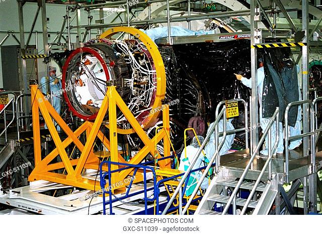 11/21/1997 --- Boeing technicians join Node 1 for the International Space Station ISS with the Pressurized Mating Adapter PMA-1 in KSC’s Space Station...