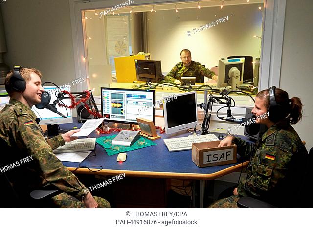 Staff sergeant Christina Flaig and lieutenant Christopher Steiger draw the winner of the Advent Calendar broadcast in the studio of the German Army radion...