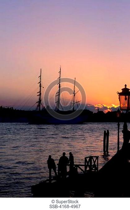 Italy, Venice, Canal Della Giudecca, Cruise ship at sunset