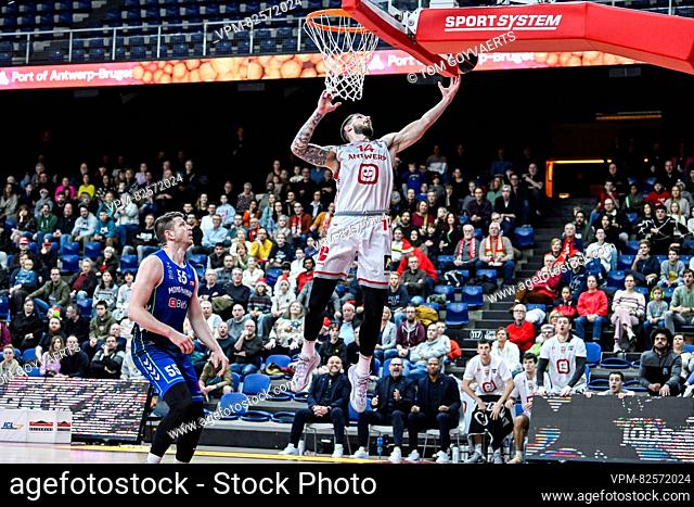 Mons' Leon Santelj and Antwerp's Roby Rogiers pictured in action during a basketball match between Antwerp Giants and Mons Hainaut
