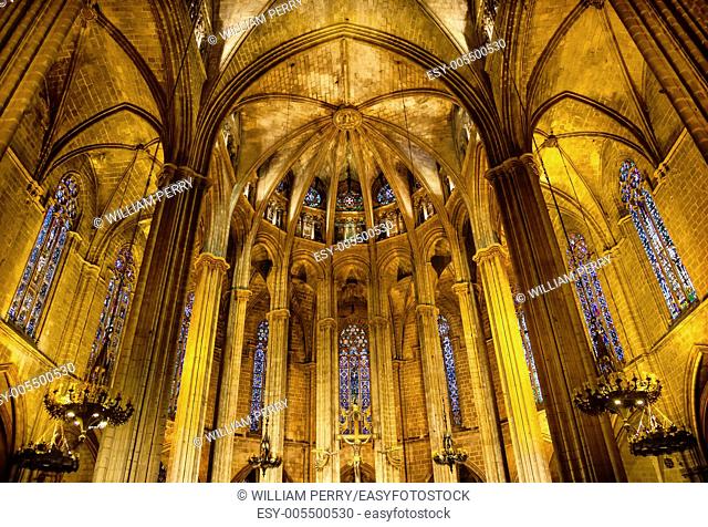 Stained Glass Windows Stone Columns Arches Altar Cross Gothic Catholic Barcelona Cathedral Basilica in Catalonia, Barcelona, Spain
