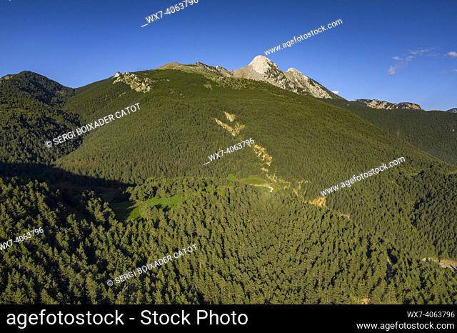 Pedraforca west face aerial view in a spring afternoon over Gósol Valley (Barcelona province, Catalonia, Spain, Pyrenees)