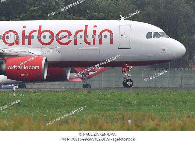 An Air Berlin plane taxiing to a runway in the rain at Tegel Airport in Berlin, Germany, 16Â August 2017. The airline filed for insolvency on 15 August