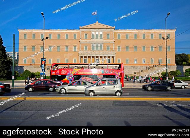 Athens, Greece - May 01, 2015: Red Sightseeing Bus in Front of Greek Parliament Building Sunny Afternoon in Athens, Greece