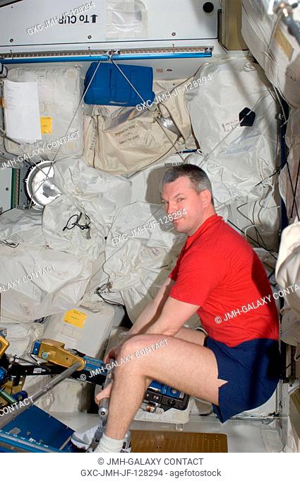 Russian cosmonaut Alexander Samokutyaev, Expedition 28 flight engineer, exercises using the advanced Resistive Exercise Device (aRED) in the Tranquility node of...