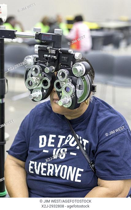 Detroit, Michigan USA - 9 August 2017 - A patient's vision is checked during the Motor City Medical Mission, a free three-day medical clinic sponsored by the...
