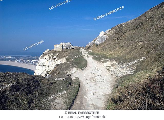 Coastal path on island. Quarry site. Clifftop path. Stock blocks. Quarry which provided valuable stone to build with