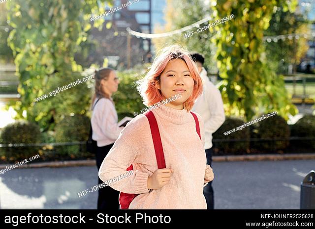 Smiling woman looking at camera