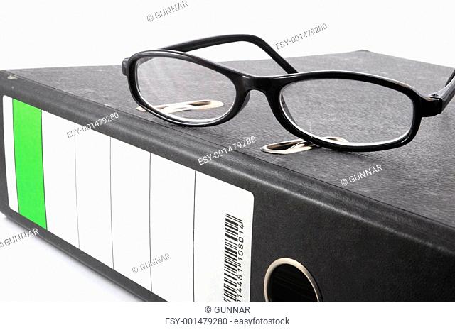 eye glasses and folder