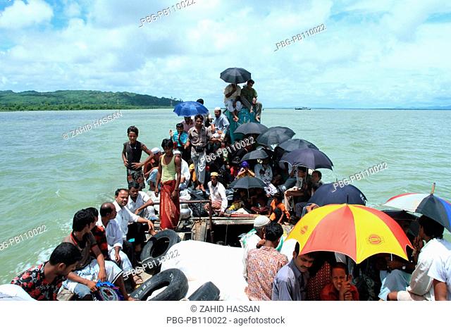 On the way to Saint MartinÆs Island by trawler, locally known as Narkel Jinjira, is the only coral island and one of the most famous tourist spots of Bangladesh...