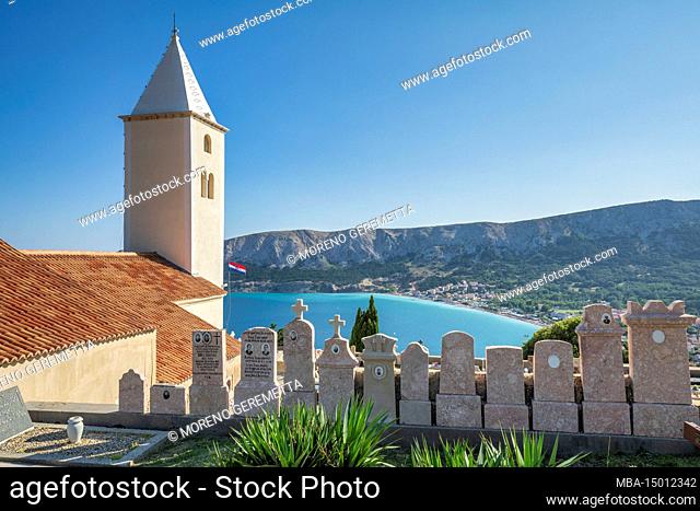 Croatia, Kvarner bay, island of Krk, Baska, Crkva svetog Ivana (St John church) above Baska and its cemetery