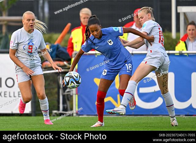 Shana Chossenotte (18) of France pictured fighting for the ball with Kimberley Dora Hjalmarsdottir (13) of Iceland during a female soccer game between the...