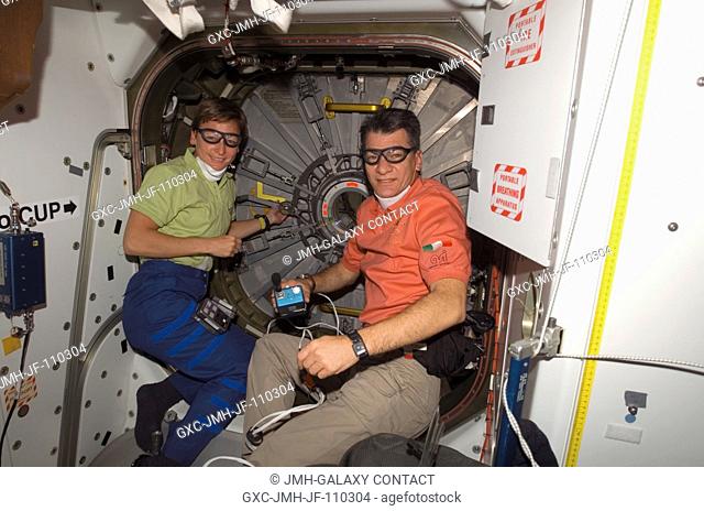 NASA astronaut Peggy A. Whitson (left), Expedition 16 commander, and European Space Agency (ESA) astronaut Paolo Nespoli, STS-120 mission specialist