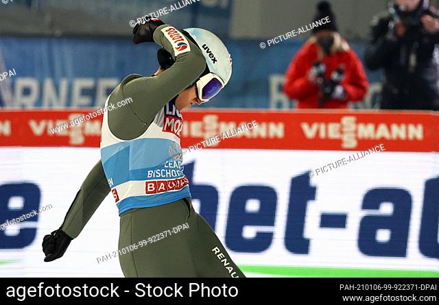 06 January 2021, Austria, Bischofshofen: Nordic skiing/ski jumping: World Cup, Four Hills Tournament, large hill, men: Poland's Kamil Stoch reacts after his...