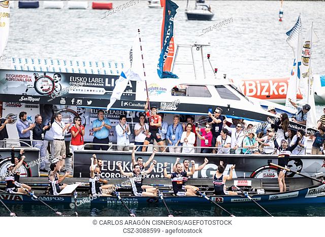 CASTRO URDIALES, SPAIN - JULY 15, 2018: Competition of boats, regata of trainera, Urdaibai Avia boat with the prize after winning the competition VI Bandera...
