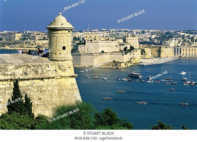 View over Bastions and Grand Harbour to Fort St. Angelo with Rowing Regatta, Valletta, Malta, Mediterranean, Europe