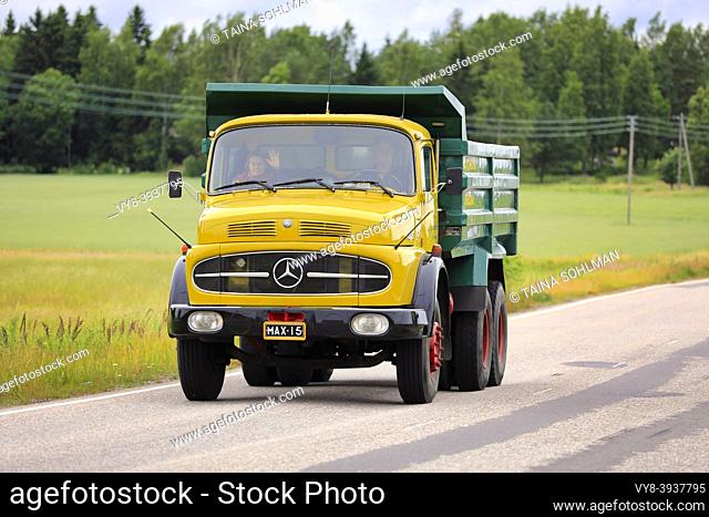 Yellow Mercedes-Benz 2624 tipper truck on vintage truck rally by The Vintage Truck Association of Finland. Suomusjärvi, Finland. July 4, 2020.