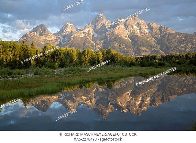 Water reflections of the Teton Range, taken from the end Schwabacher Road, Grand Teton National Park, Wyoming, USA