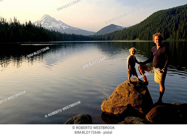 Caucasian father and son standing by Lost Lake, Hood River, Oregon, United States