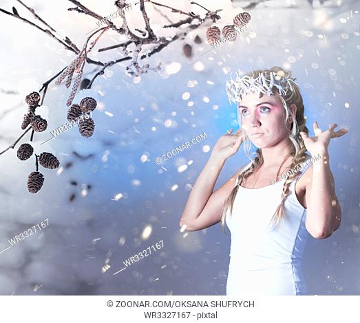 Fantasy winter queen from fairytale forest, ice makeup