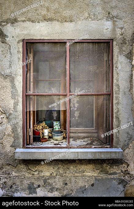 Old window with fly screen in Fleury d'Aude