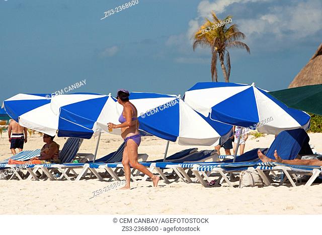 Scene from the beach with umbrellas and sunbeds, Isla Mujeres, Cancun, Quintana Roo, Yucatan Province, Mexico, Central America