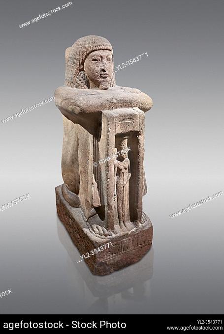 Ancient Egyptian statue of Qen, priest of Anukis, sanstone, New Kingdom, 19th Dynasty, (1292-1191 BC), Isalnd of sehel. Egyptian Museum, Turin