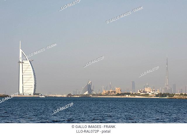 Burj Al Arab from Palm Jumeirah with cityscape in background, Dubai, United Arab Emirates