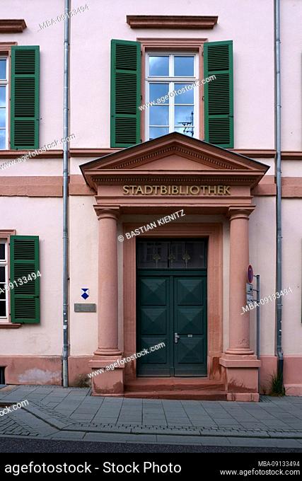 The pillar entrance or portico of the city library in Bad Homburg in a narrow street