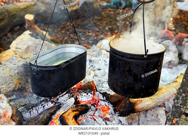 Two pots above the fire