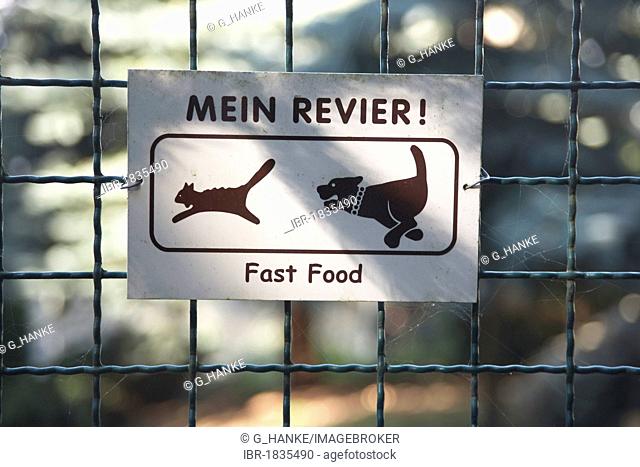 Sign, warning about the dog, Mein Revier! Fast Food, German for My territory!, pictogram of a dog and a cat