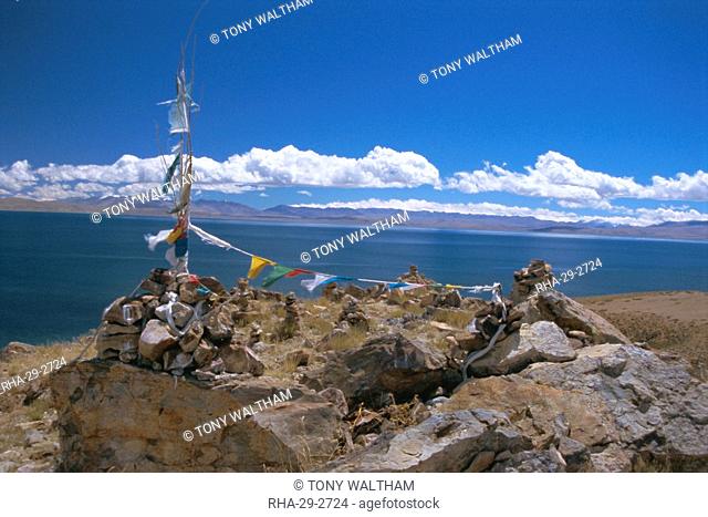 Prayer flags over sky burial site, Lake Manasarovar Manasarowar, sacred lake just south of Kailas Kailash, Tibet, China, Asia