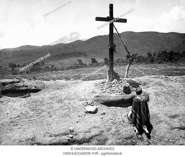 Ecuador: c. 1900. A devout wayfarer pauses before a lonely shrine on the road to Quito