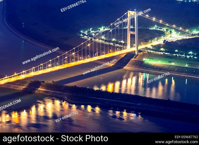 xiling yangtze river bridge at night, one of the key traffic projects of the three gorges project, yichang city, hubei province, China