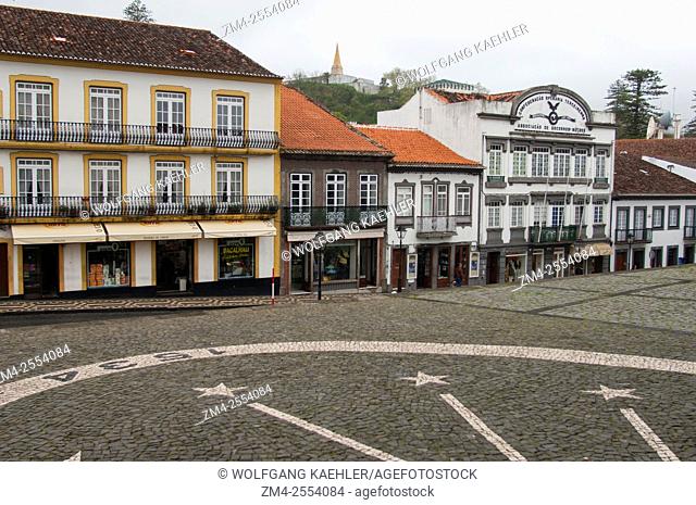 A street scene with traditional houses with wrought iron balconies in the old city of Angra do Heroismo, a UNESCO World Heritage Site
