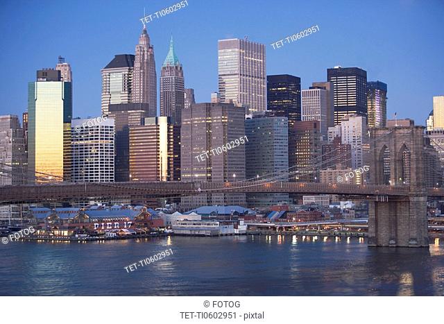 USA, New York state, New York city, Brooklyn Bridge with skyscrapers at night