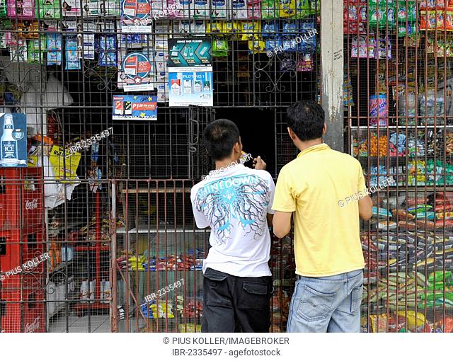 Boys at a kiosk in Cebu, Philippines, Southeast Asia, Asia